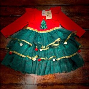 Brand new with tags attached holiday dress size 2T from Mia Belle girls